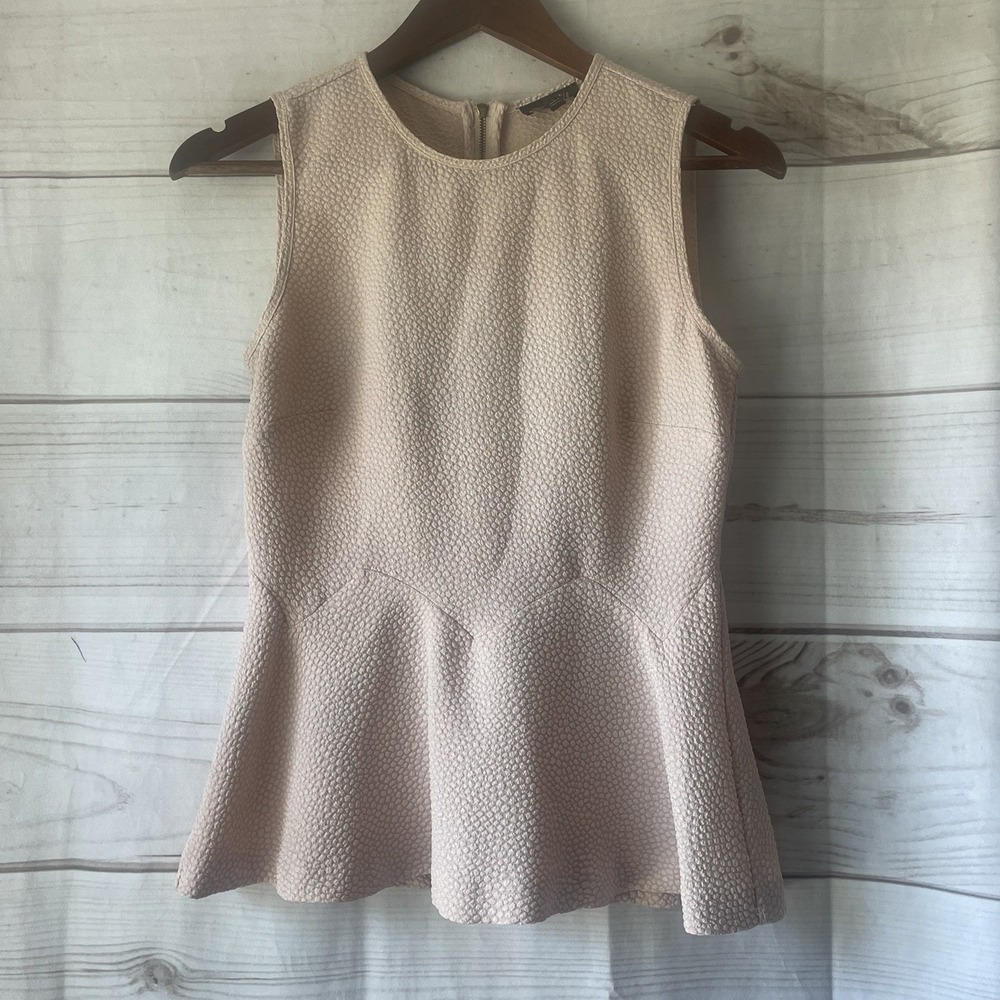 The Limited Textured Sleeveless Peplum Top in Blush, Size Small